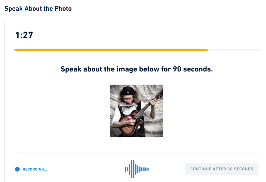 A screenshot of the det question type: "Speak About the Photo" 